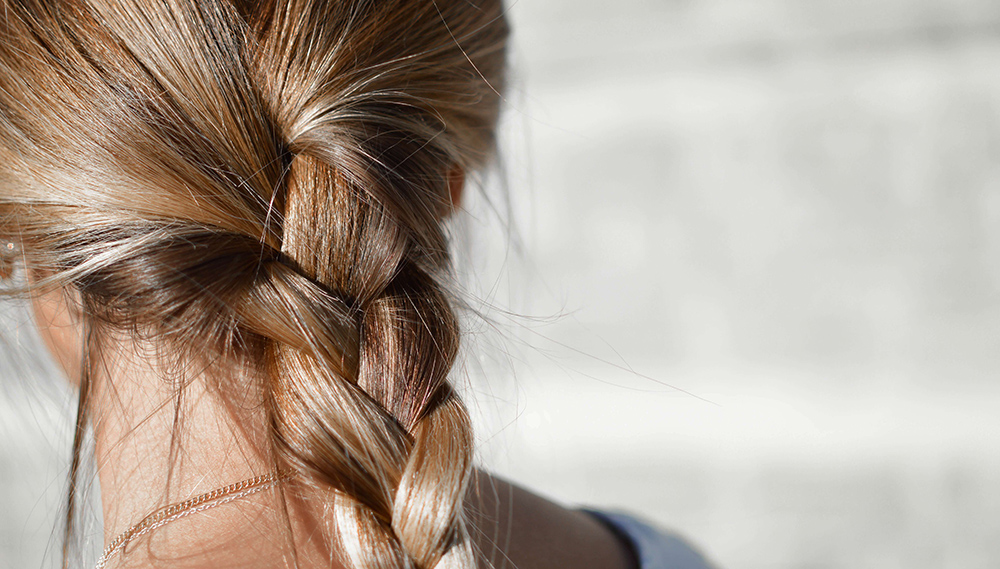 Image of a woman with a french braid