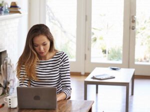 woman on computer booking appointment