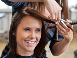 woman getting haircut