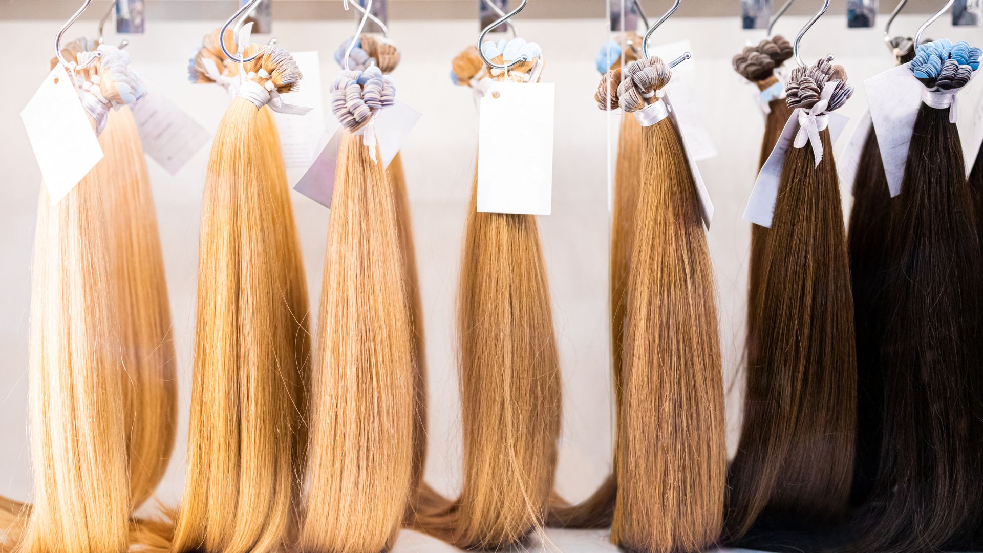 Range of hair extensions hanging.